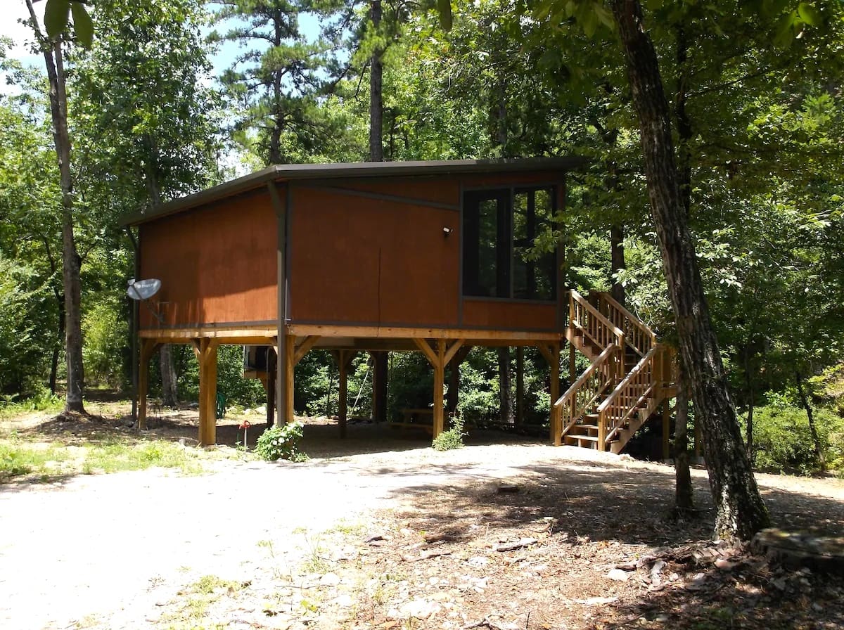 House on stilts in the woods