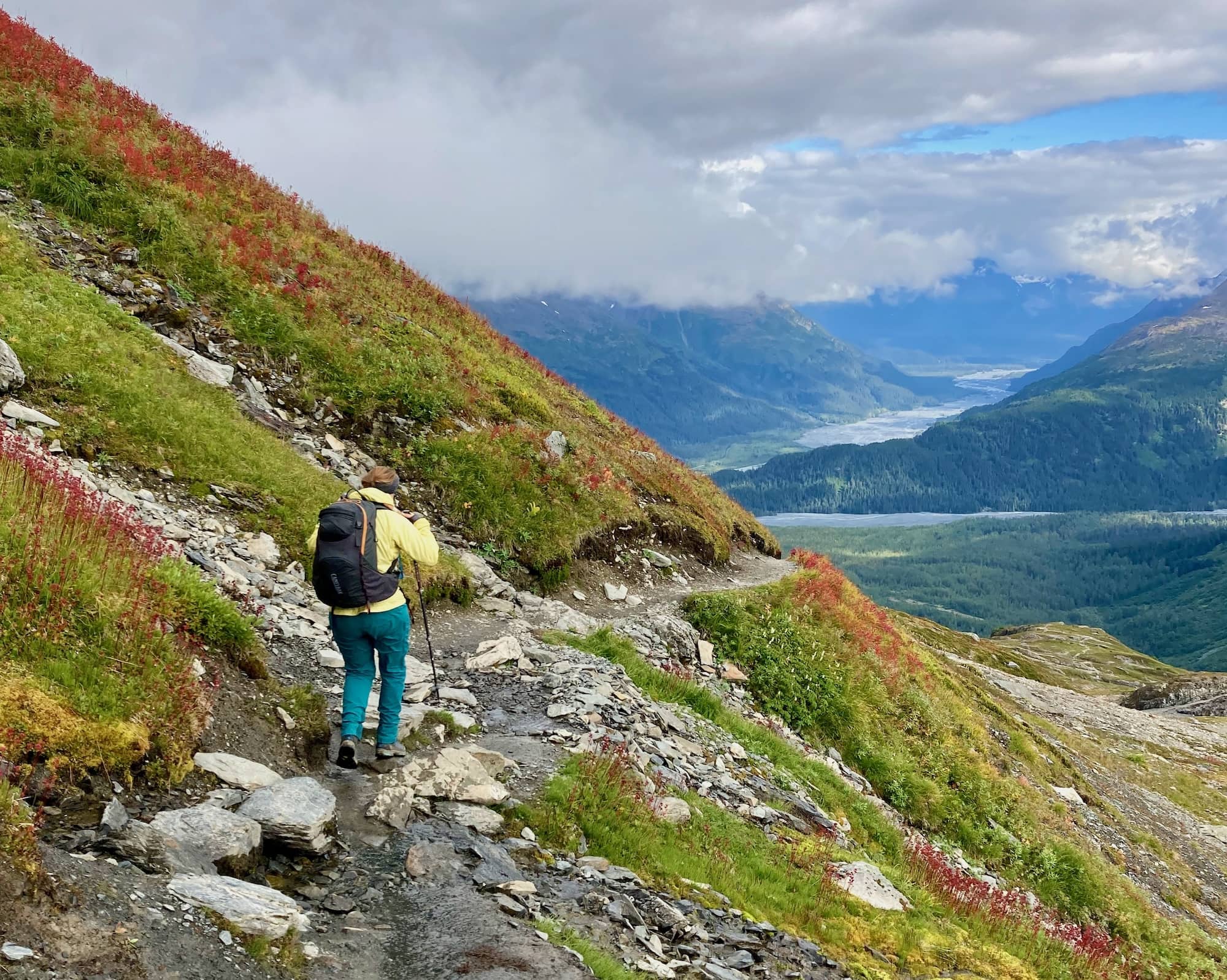 A girl hiking in the mountains.